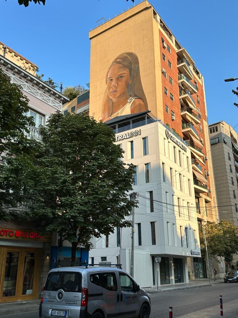 Beautiful street art in Tirana, mural of a girl