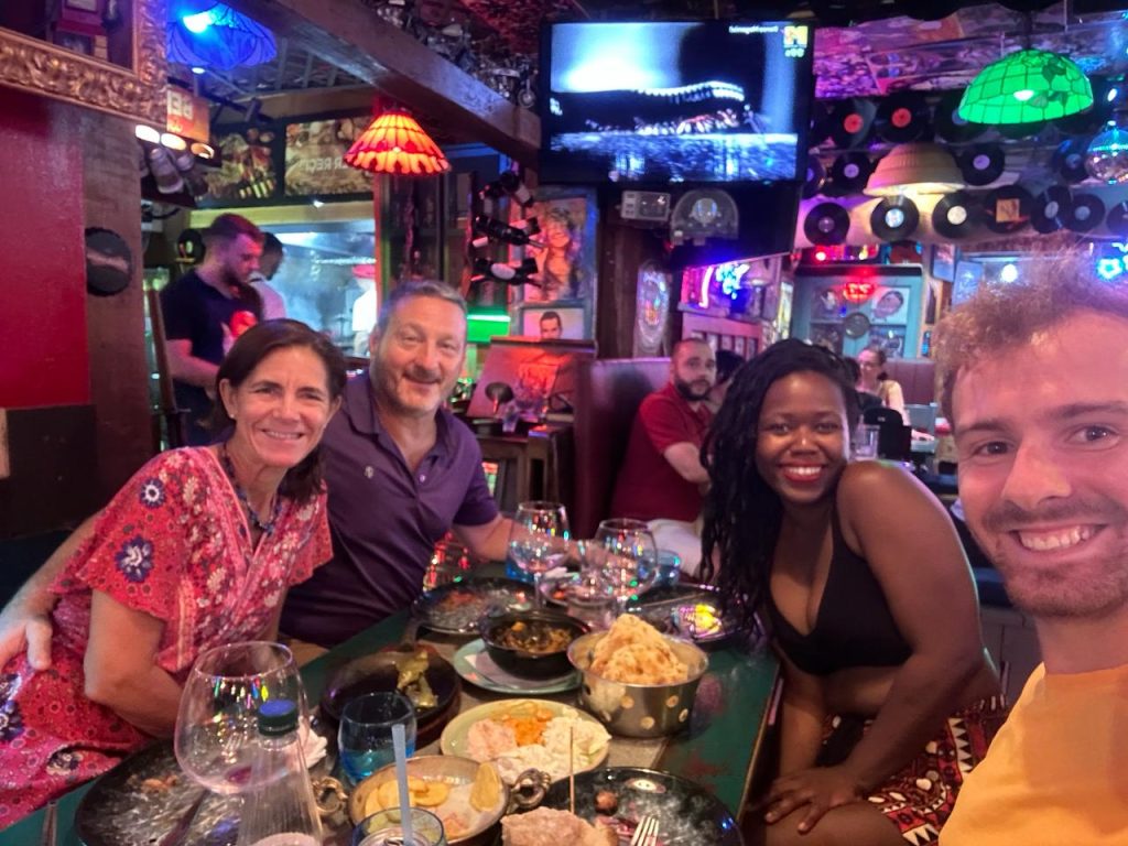 Us enjoying a dinner after the food walking tour in Tirana, group picture
