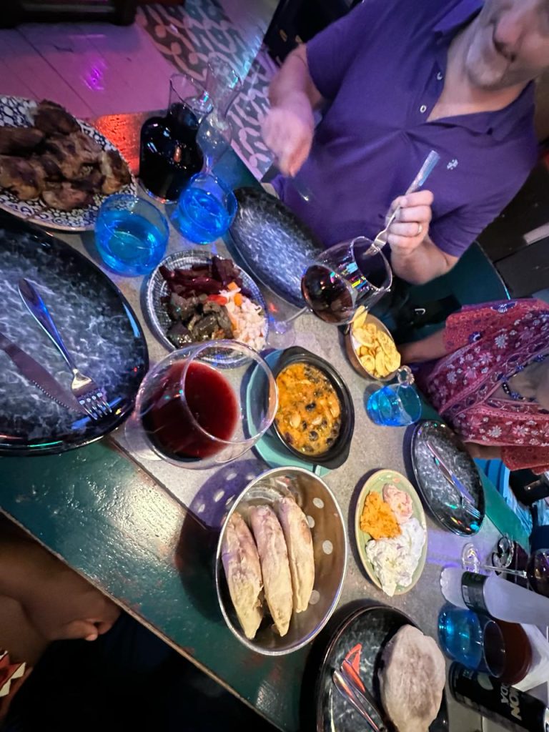 Us enjoying a dinner after the food walking tour in Tirana