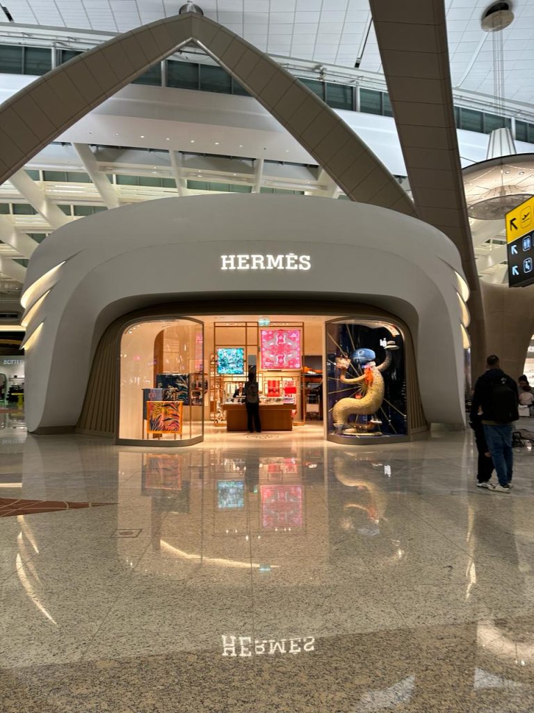 abu dhabi zayed airport terminal Hermes Store