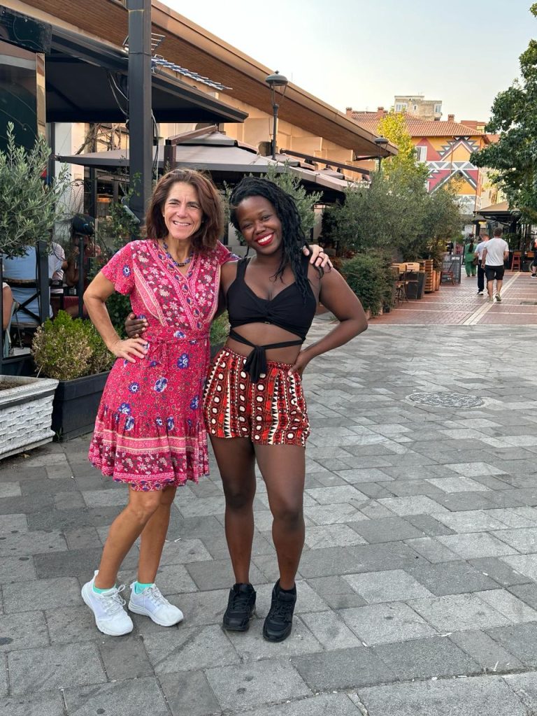Stef Barti and another solo female traveler posing at Pazari I Ri market