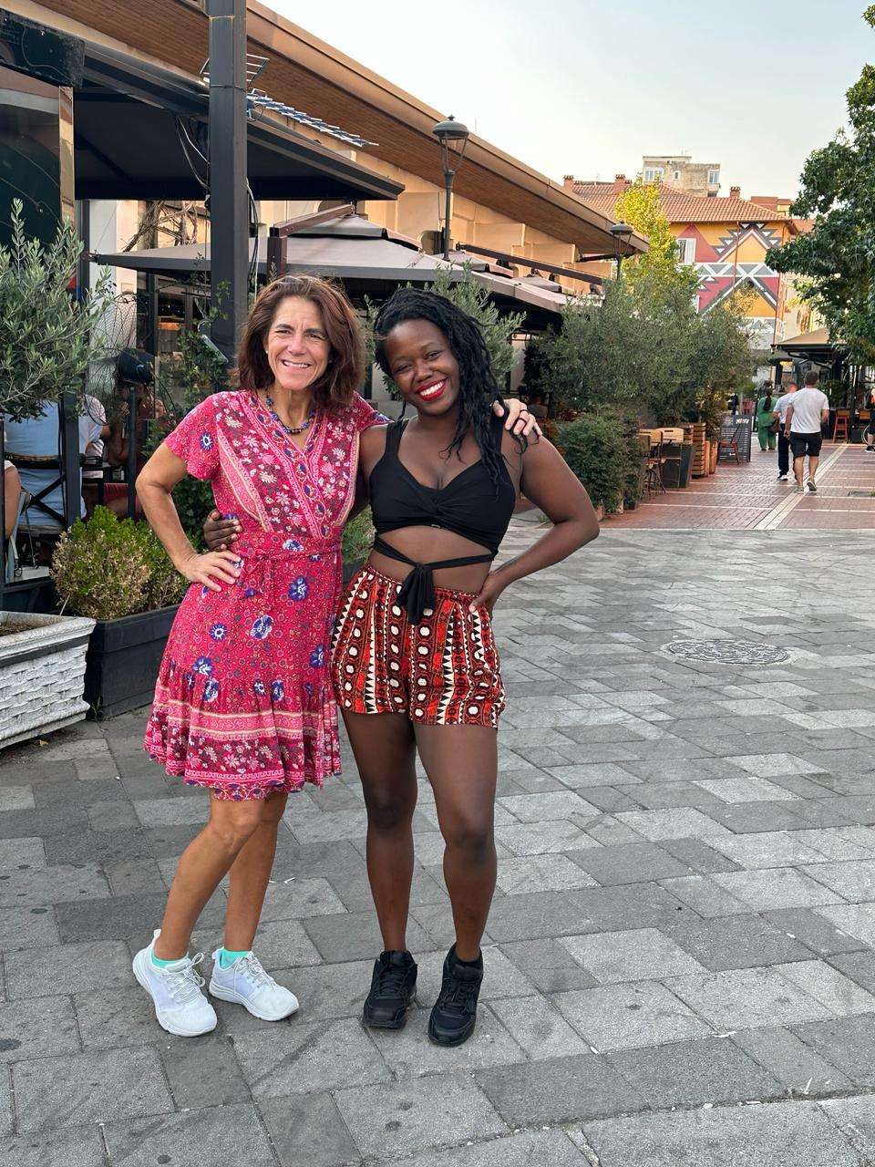 Stef Barti and another solo female traveler posing at Pazari I Ri market