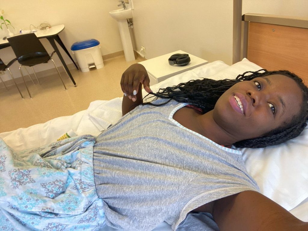 Stef Barti in her hospital bed before hysterectomy surgery