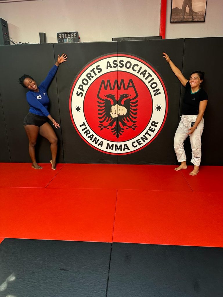 Stef Barti and another girl doing BJJ at Tirana MMA centre