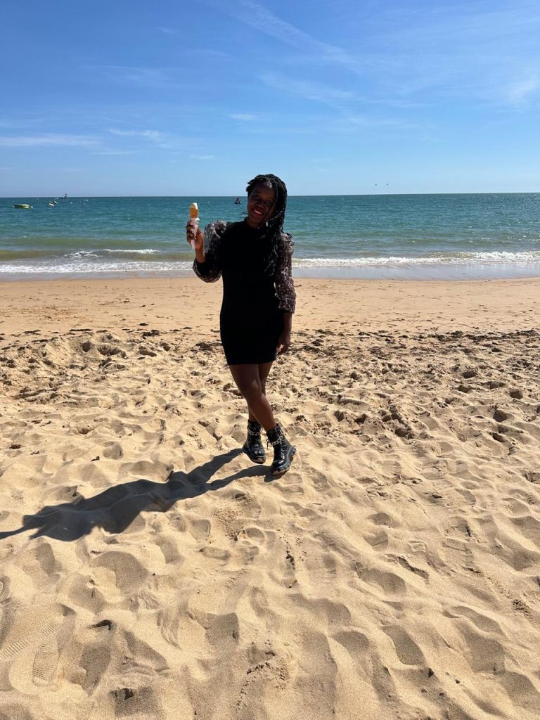me eating ice cream at the beach in Albufeira