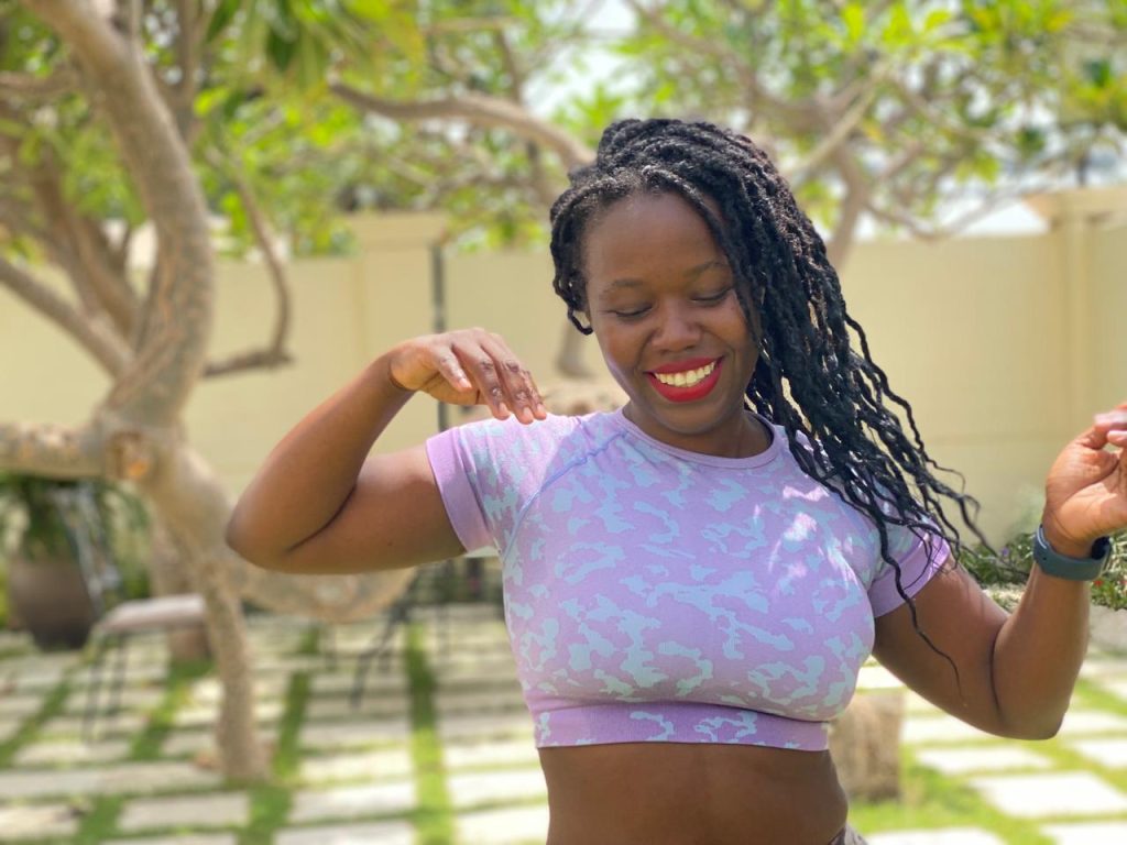 picture of stef barti dancing in garden and smiling