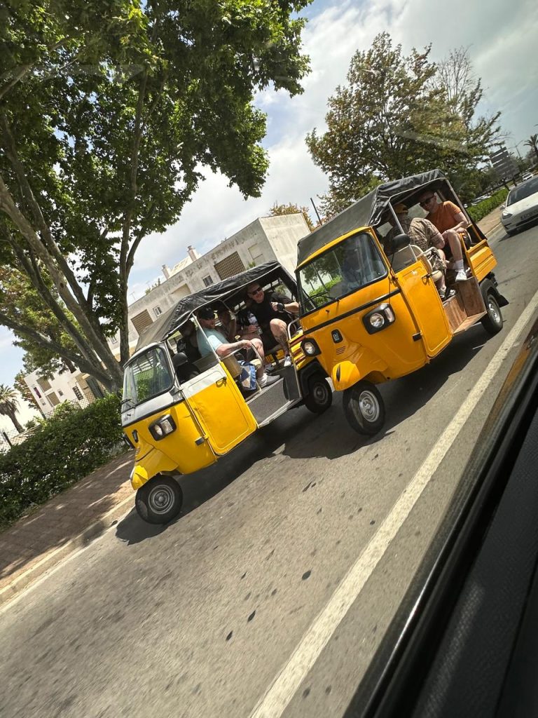 yellow tuk tux taxi in Albufeira