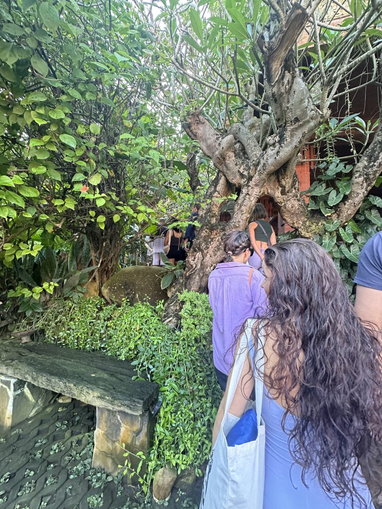 a line of people waiting to attend the Udara Bali Sunday Festival