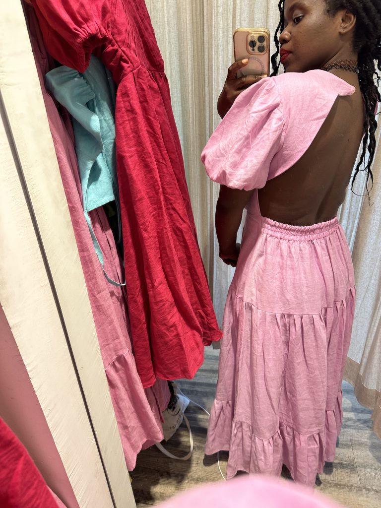 Stef Barti trying on linen dresses at Samara Store in Ubud Bali