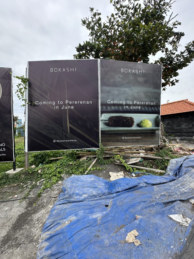 advertising and construction everywhere in the streets of Canggu
