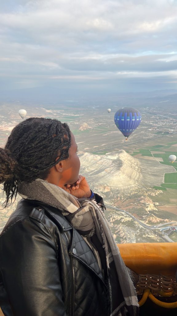 stef barti riding a hot air balloon in Cappadocia solo female travel