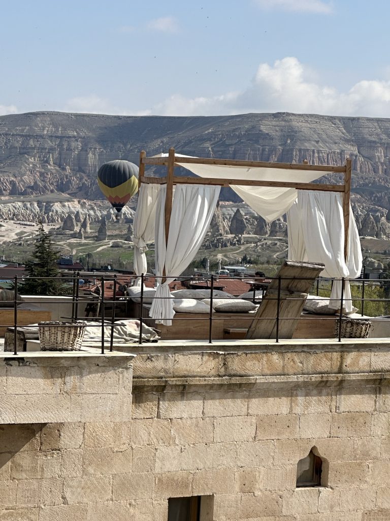 cappadocia terrace with air balloon background 
