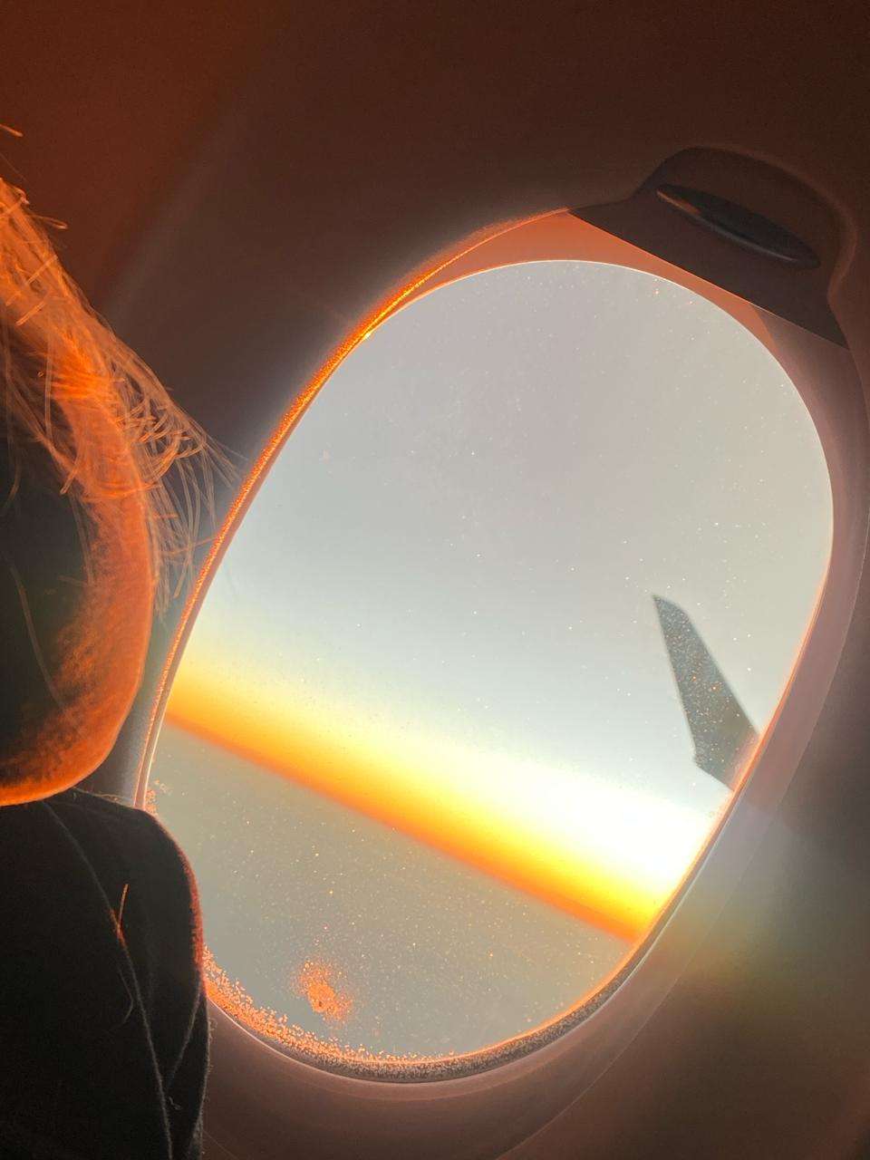 picture of a beautiful sunrise in the plane