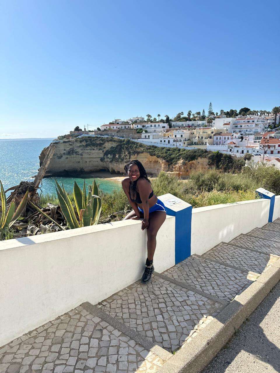 Stef Barti posing at cavoeiro with a beach backdrop