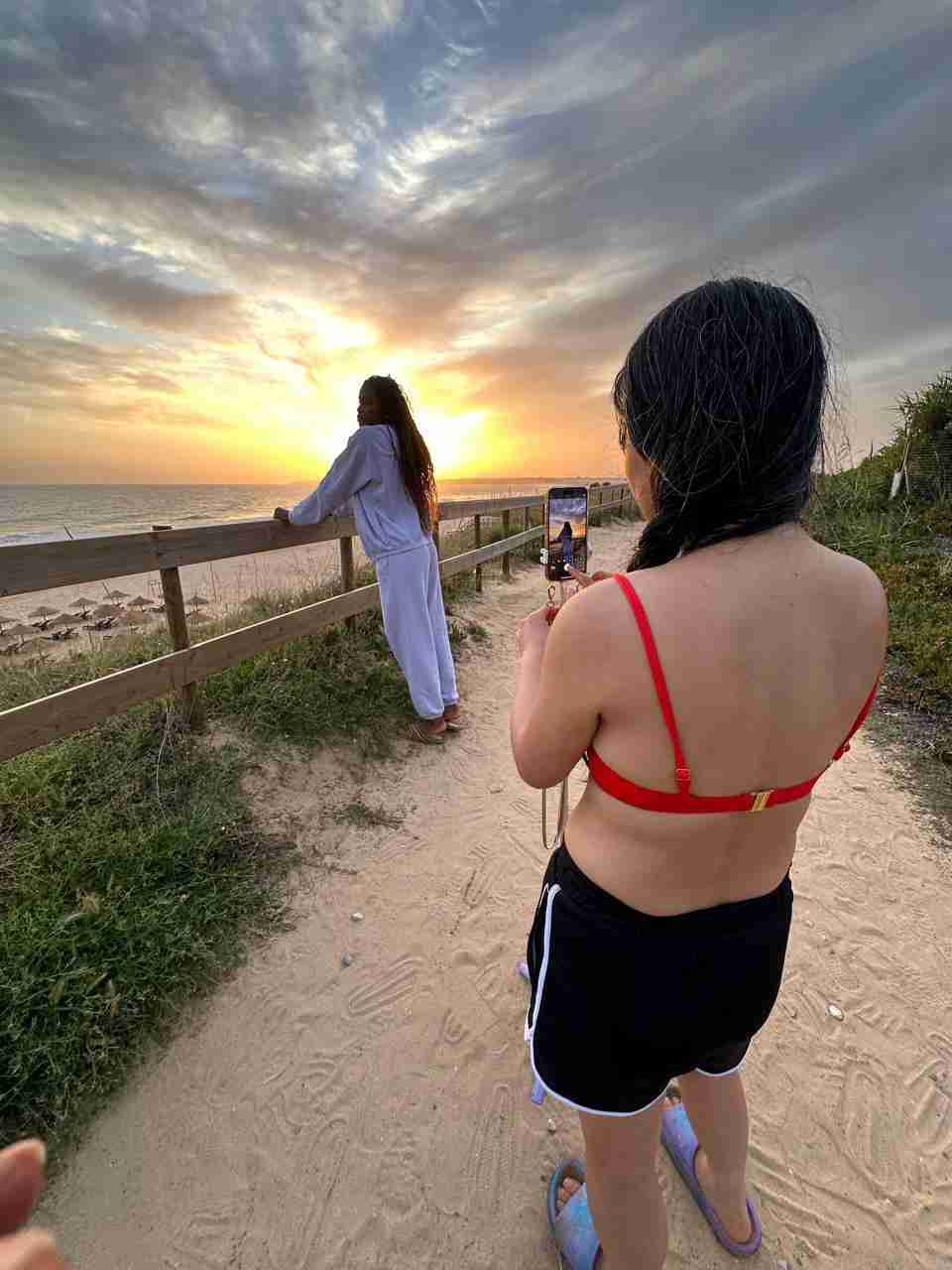 girls taking selfie albufeira sunset