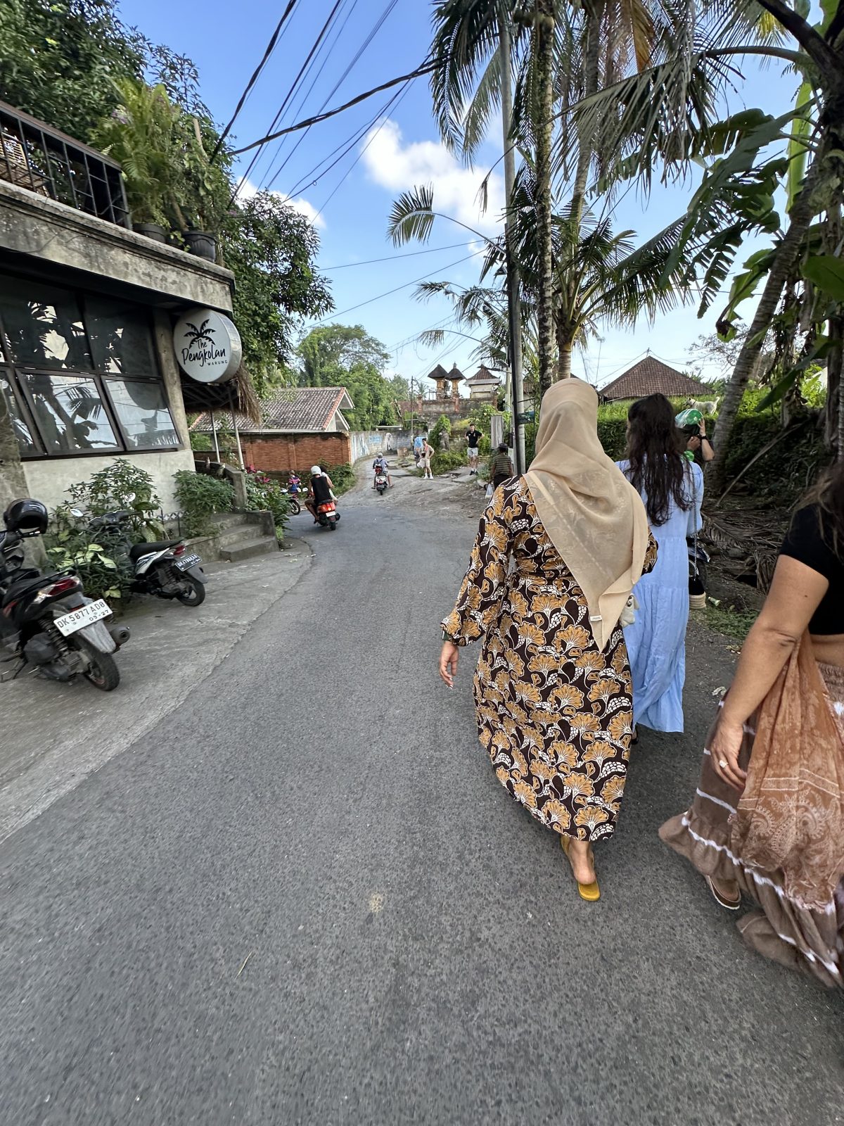 women retreat group walking in Ubud streets