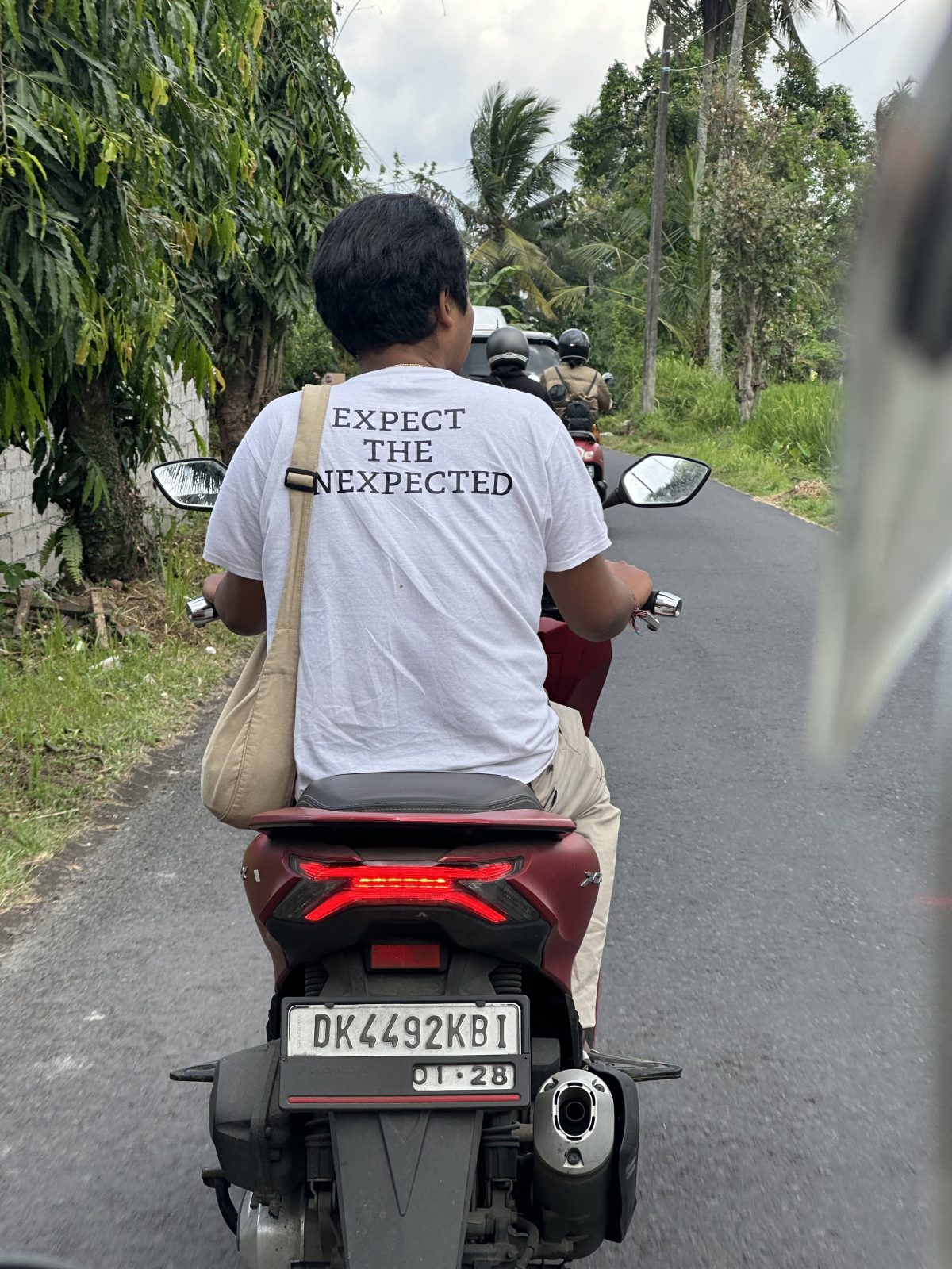 Scooter passenger on Ubud roads