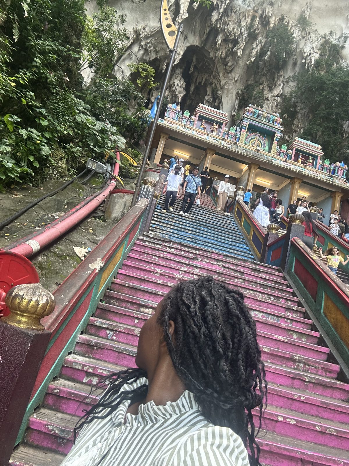 Stef_barti_taking_picture_at_272_steps_batu_cave_traveling_solo