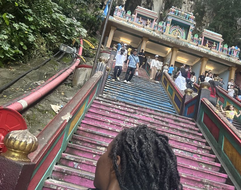 Stef_barti_taking_picture_at_272_steps_batu_cave_traveling_solo